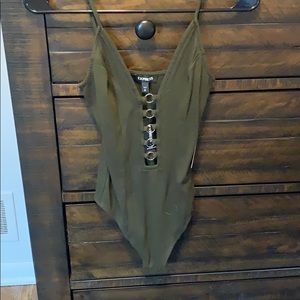 Express green deep v body suit with metal detail